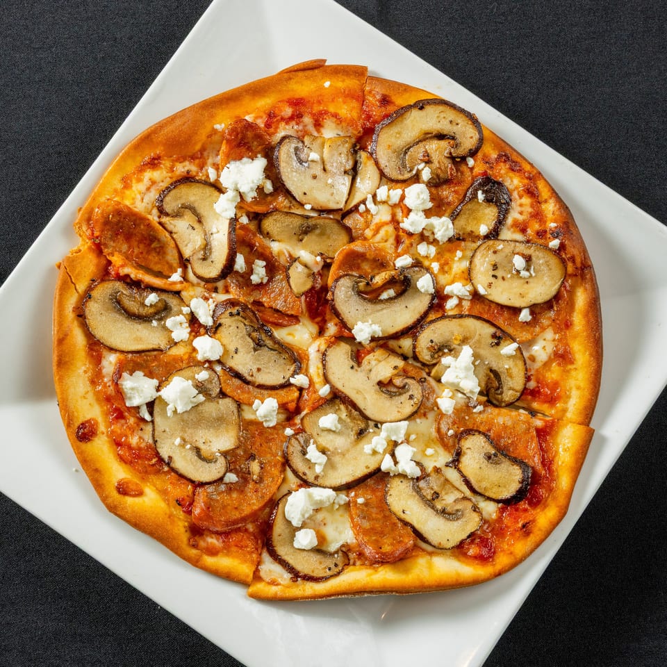 Indulge in Our Pizza